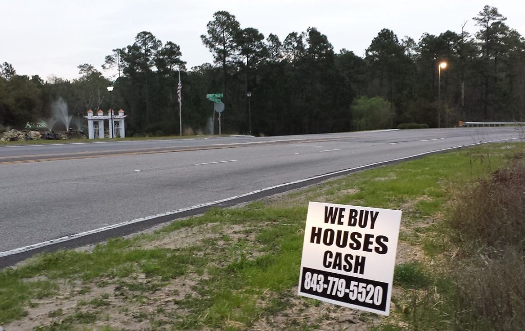 real estate investment bandit sign