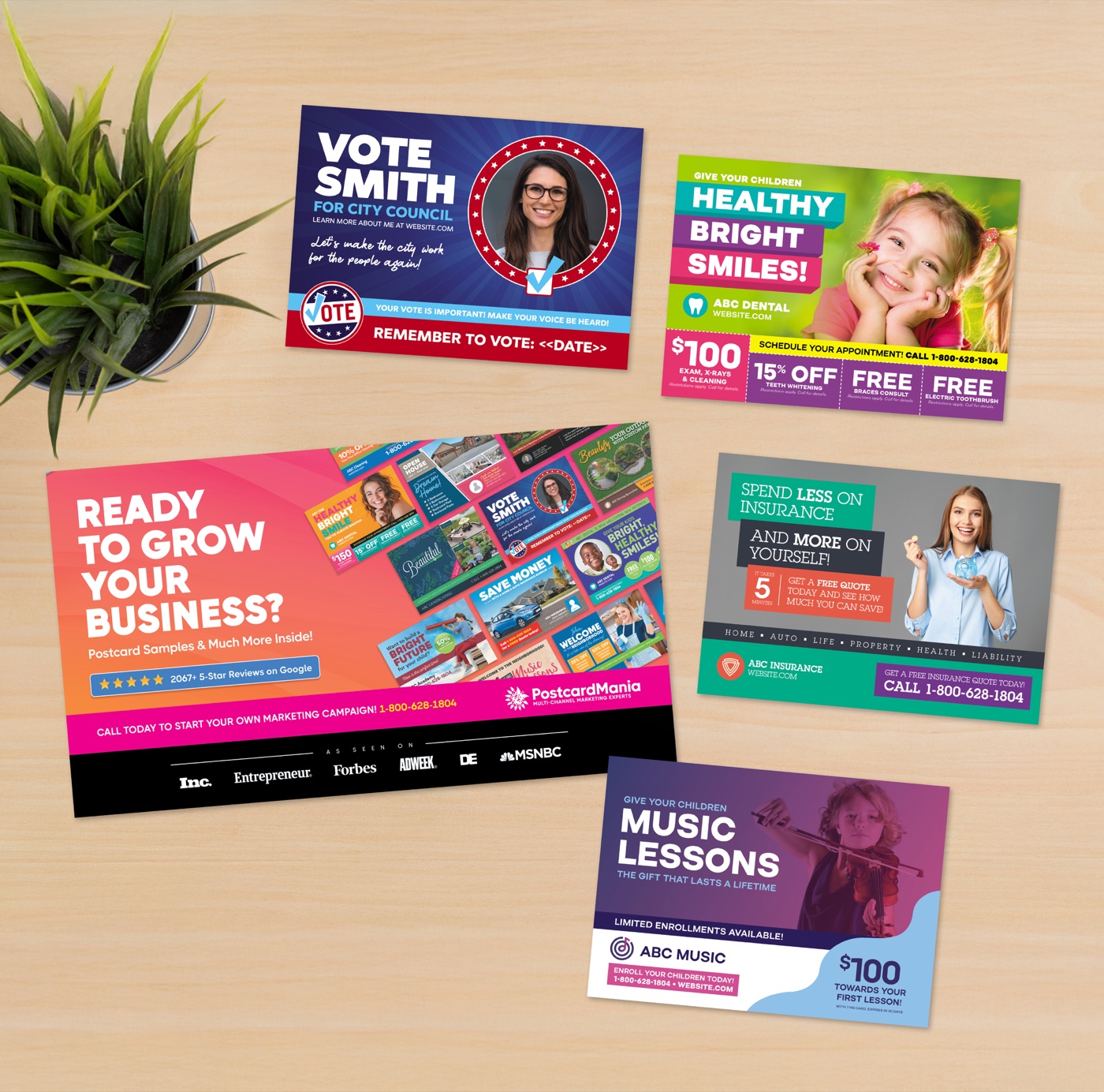 Postcard samples arranged on a desk