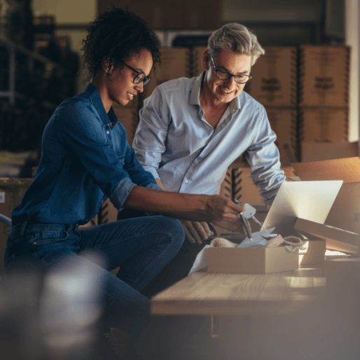 Small Business Owners Looking Over Financial Resources