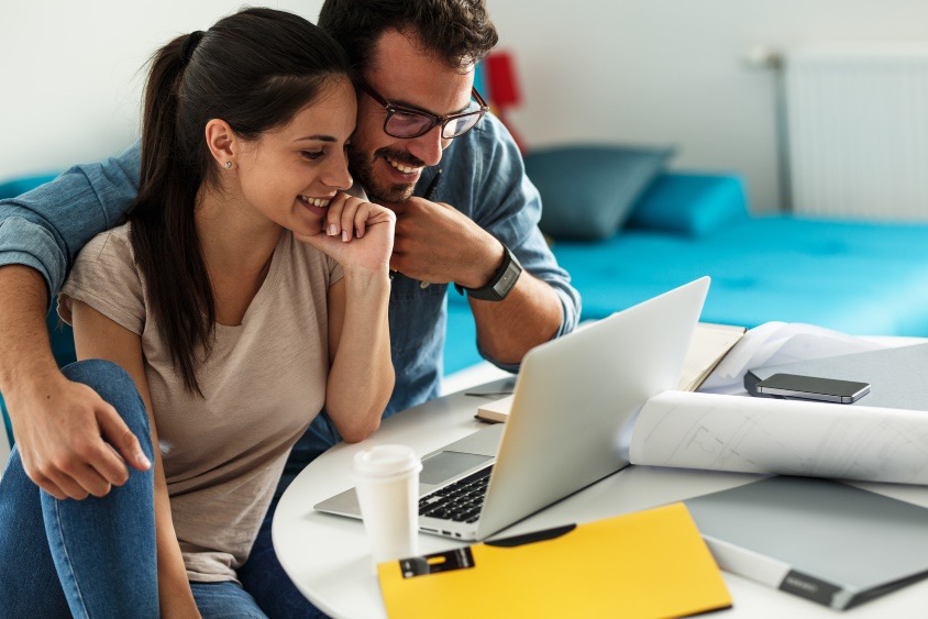 couple looking at laptop screen
